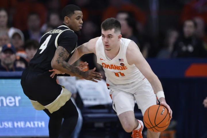 Clemson adds Syracuse's Girard, 3 others to hoops team