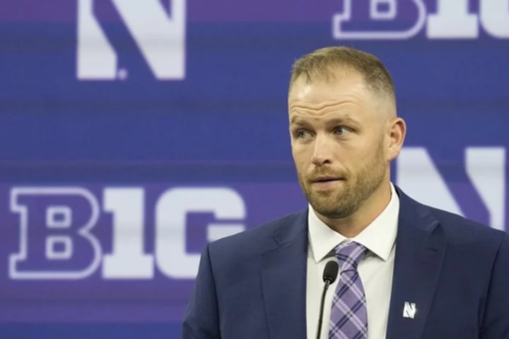 Northwestern interim coach fends for himself as Wildcats players skip annual Big Ten kickoff