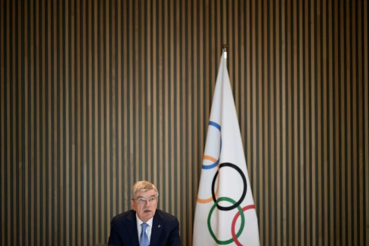 IOC chief echoes call for Russian return during Paris visit