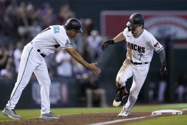 Carroll hits 25th homer, steals 50th base to lead Kelly and the Diamondbacks past the Giants, 7-1