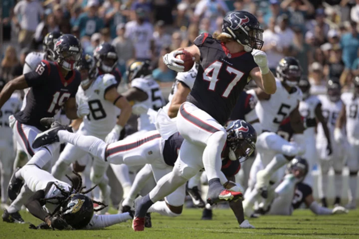 Beck's rare TD return propels Texans to a 37-17 rout of Jaguars and gives Ryans his first win