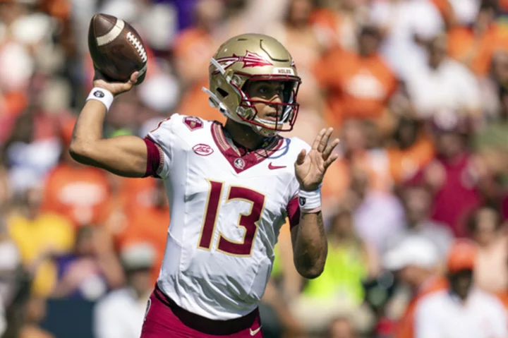 No. 4 Florida State snaps 7-game losing streak against Clemson with 31-24 victory behind Travis