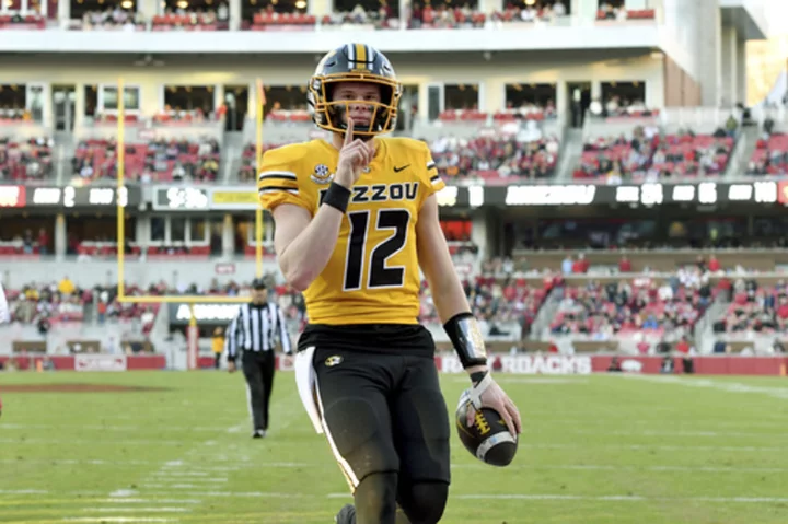 Cody Schrader runs for 217 yards and a TD, No. 9 Missouri beats Arkansas 48-14