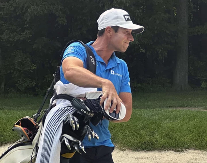 Hovland goes from winning Memorial to caddying in US Open qualifier