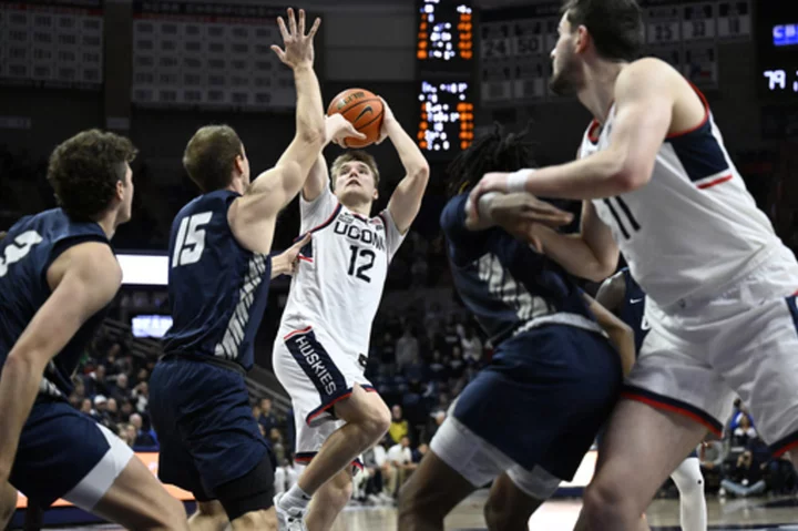 No. 4 UConn heads to No. 5 Kansas for rare matchup of the past two national champions