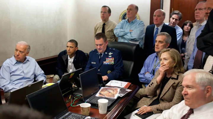 Here's a Picture of Barack Obama Laughing at a Meme of Himself the Day After bin Laden Was Killed