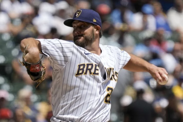 Brewers LHP Wade Miley returns to injured list with discomfort in his throwing elbow