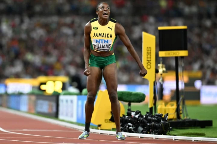 Williams edges Olympic champion to win second world hurdles title