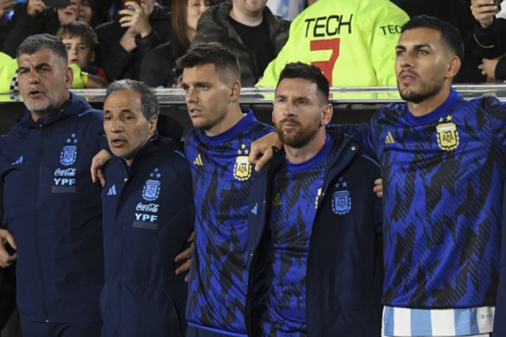 Lionel Messi sits on the bench for Argentina's World Cup qualifying match against Paraguay