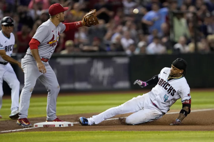 Carroll's 2-run triple in the 8th rallies Diamondbacks past Cardinals 3-1 to snap a 5-game skid