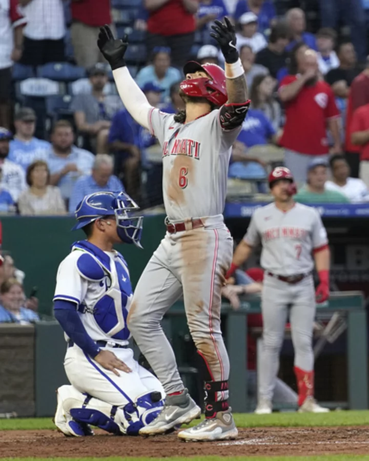 Reds homer 3 times in fifth, roll to 7-4 win and sweep of Royals