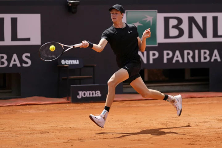 Jannik Sinner cheered on by orange-clad fans during Italian Open victory