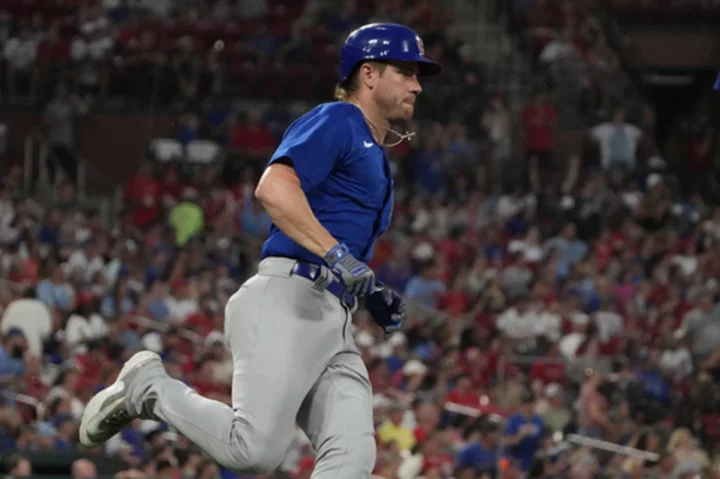 Wisdom homers, Mancini has RBI single as Cubs beat Cardinals 3-2 for seventh straight win