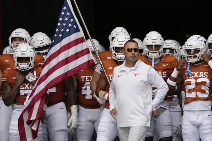 Texas coach Sarkisian promotes 