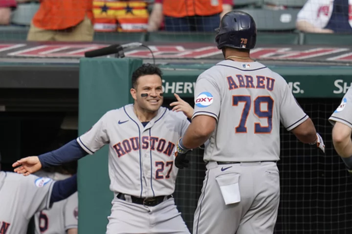 Abreu homers, drives in 3 as Astros hold off Guardians 6-4 following marathon series opener