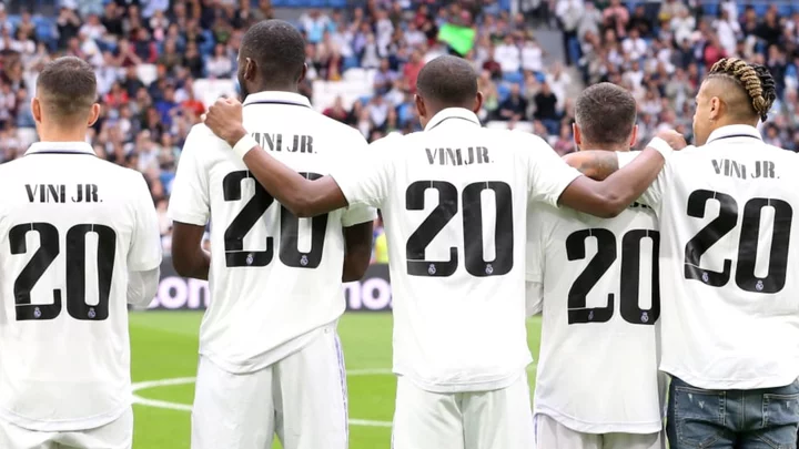 Real Madrid players show support for Vinicius Junior with shirt gesture