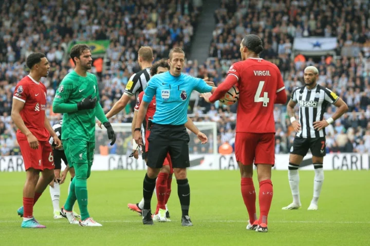 Liverpool's Van Dijk charged by FA over red card reaction