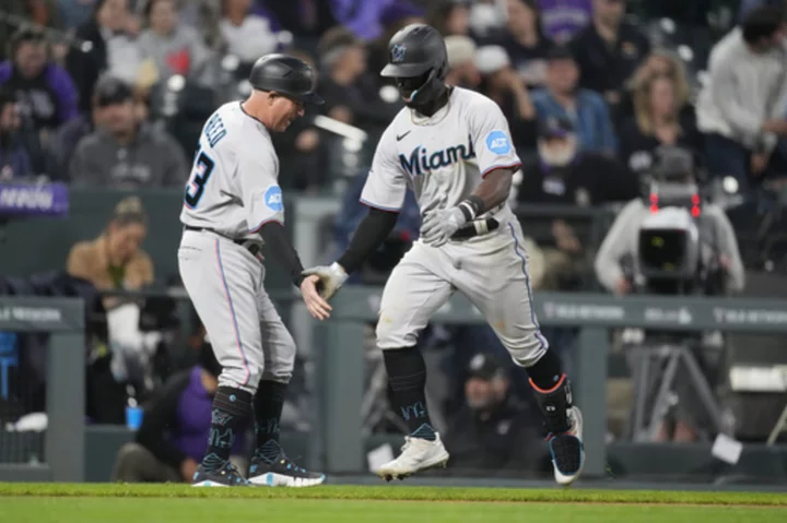 Yuli Gurriel has 4 hits to help Marlins rout Rockies 10-2