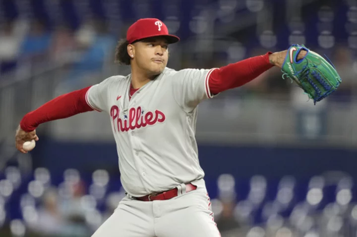 Phillies' Walker shuts down Marlins to become majors first pitcher with 12 wins