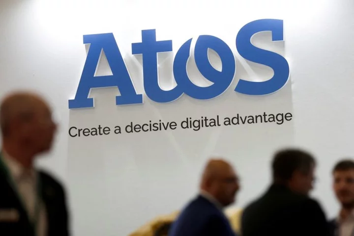 Top banker Mustier takes over as crisis-hit Atos chairman