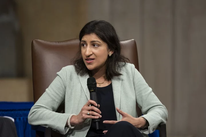 FTC’s Khan Says Enforcers Need to Be ‘Vigilant Early’ With AI