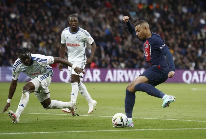 Soccer-Nice top Ligue 1 after win against Marseille, PSG beat Strasbourg