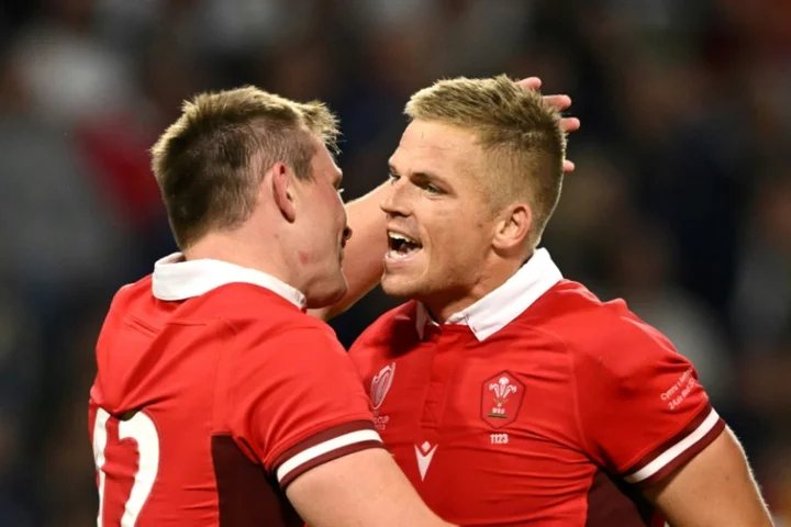 Wales blow away Wallabies to reach World Cup last eight, Scots win