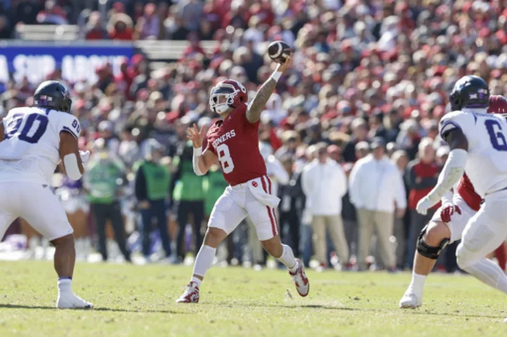 Gabriel passes for 400 yards as No. 13 Oklahoma beats TCU, 69-45, to help Big 12 title hopes