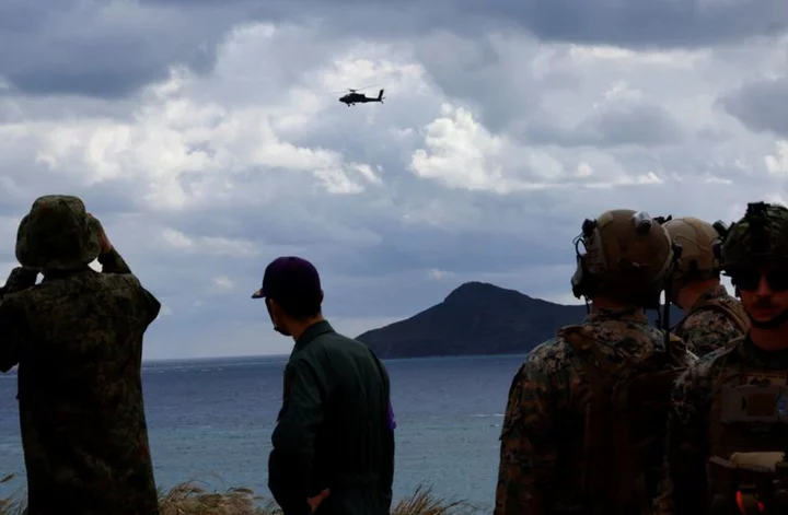 Japanese helicopters train to repel invaders amid nationwide military drills