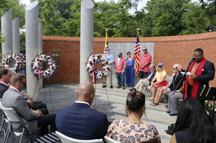 In Maryland's capital, a memorial is held for newspaper attack victims after another mass shooting