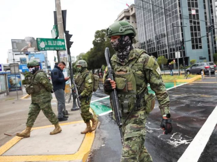 Assassinations cast a grim shadow as Ecuador selects a new president