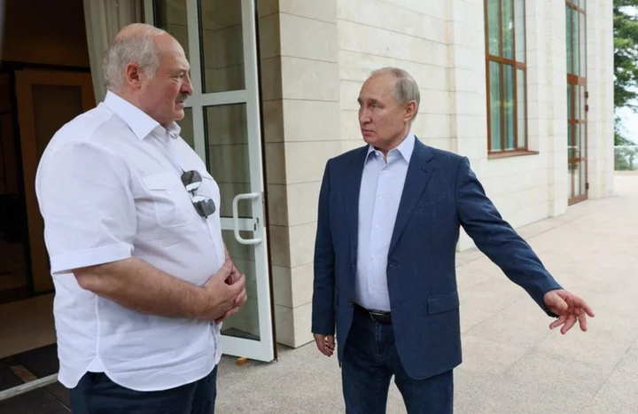 Analysis-Belarus leader, long the supplicant, feted in Russia after mutiny role