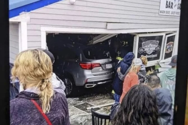 Car crashes into New Hampshire restaurant, injures dozens, pins man in bathroom