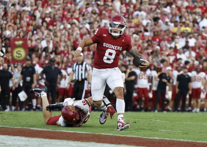 Gabriel has hand in 5 TDs to help No. 14 Oklahoma rout Iowa State 50-20, with Texas up next