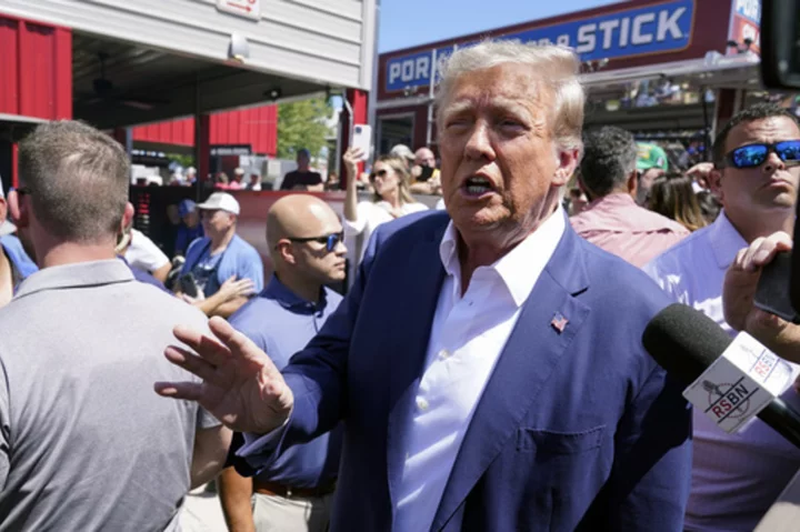 Trump's Iowa state fair spectacle clouds DeSantis as former president is joined by Florida officials