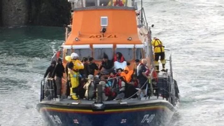 Channel migrants: France arrests four people over fatal sinking