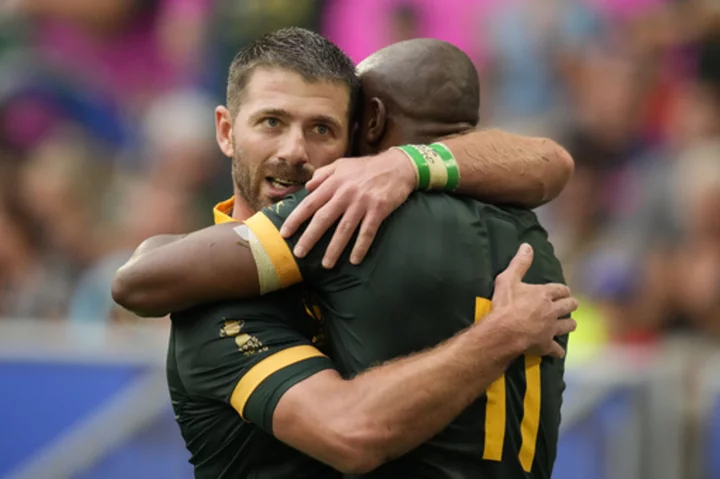 South Africa thumps Romania 76-0 at Rugby World Cup with hat tricks for Reinach and Mapimpi